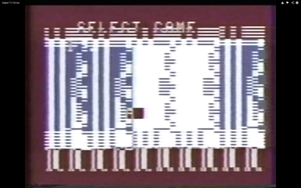 Screenshot from Digital TV Dinner, showing simple block graphic corruption. Screen is red with white lines and blocks.